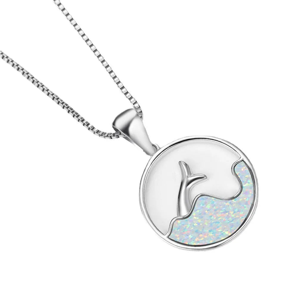 White gold electroplated necklace with geometric sea fishtail pendant featuring round blue opal stone