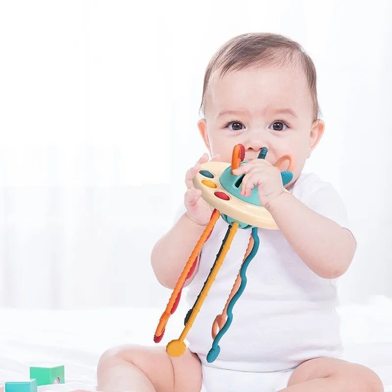 Sensory development silicone finger lala play toy in ABS food grade silicone, 12x21cm, on a light background