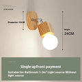 A narrow 24cm wide mirror-finish LED wall lamp with a single light head.