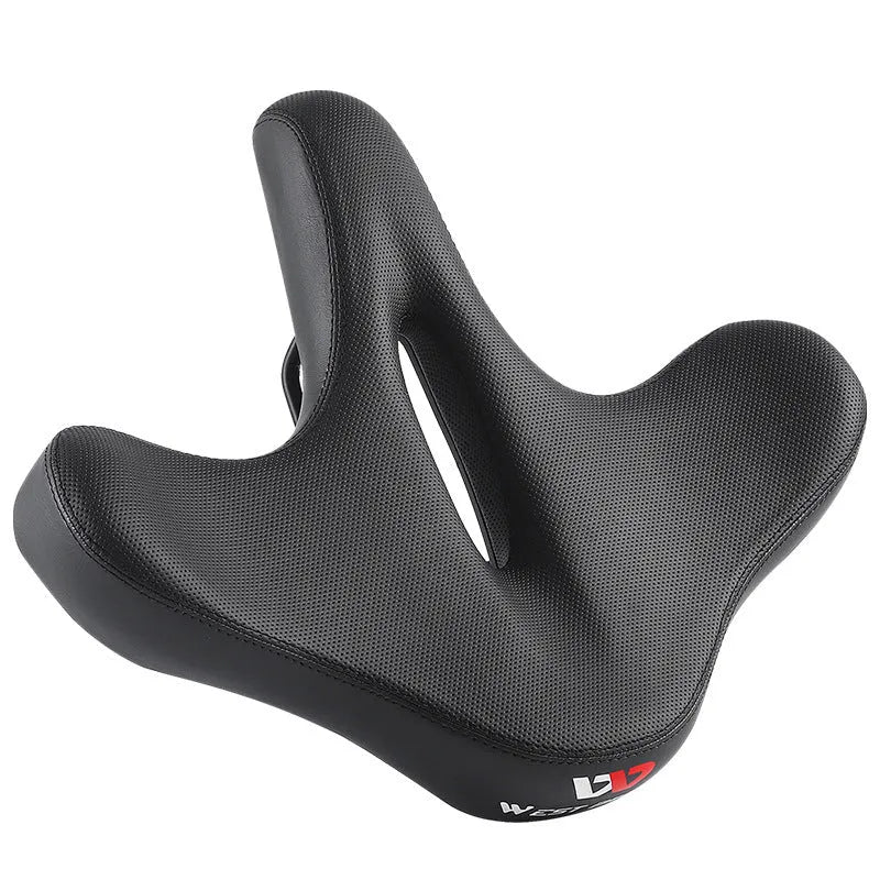 Black leather bicycle saddle cushion with thick foam padding on a bike seat.