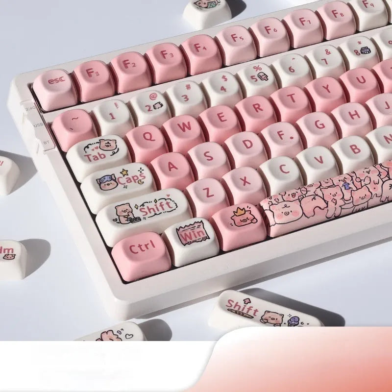 Close-up of a pink PBT key cap with a detailed Fragrant Pig design, showing five-sided sublimation printing.