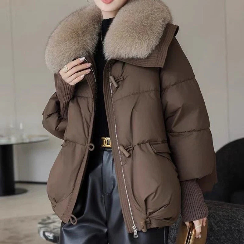 Women's winter down jacket with elegant fur collar available in brown, black, and white.