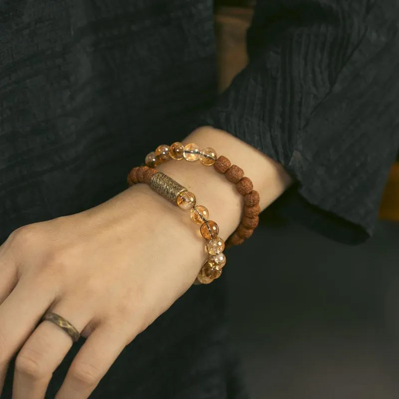 Original Retro personalised LCD double circle bracelet in citrine colour on wrist.