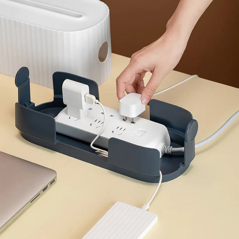 Blue and white HIPS power strip storage box with dustproof cover showing cable routing holes