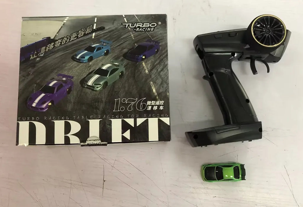 Turbo Racing C64 blue 1:76 scale drift RC car with P21-SVC radio remote control