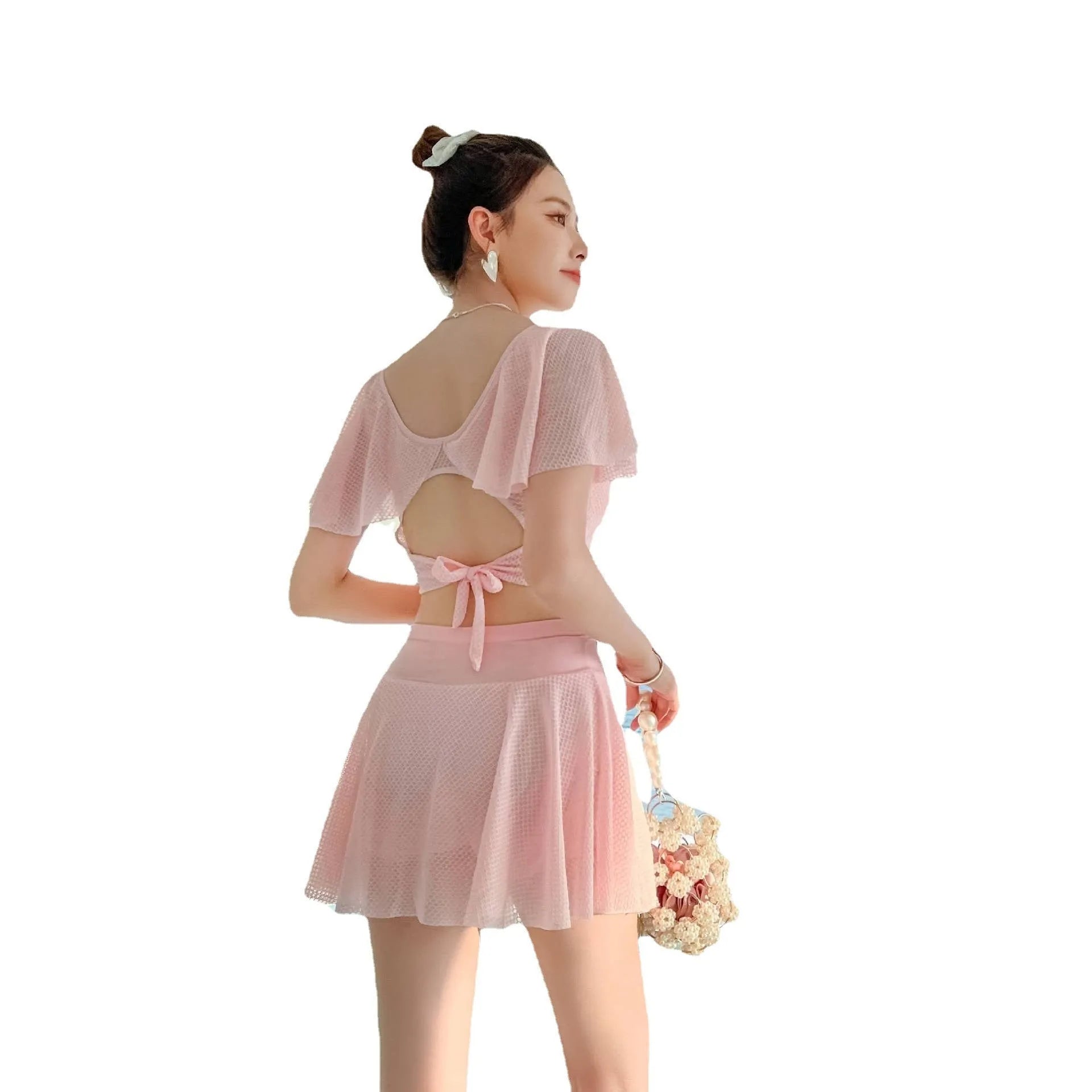 Women's two-piece skirt swimsuit in solid colour with separate top and skirt components