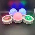 Colourful gradient 3D shooting night light with USB cable, touch panel, and remote control.