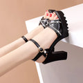 Women's black and white PU high heel sandals showing open-toe design