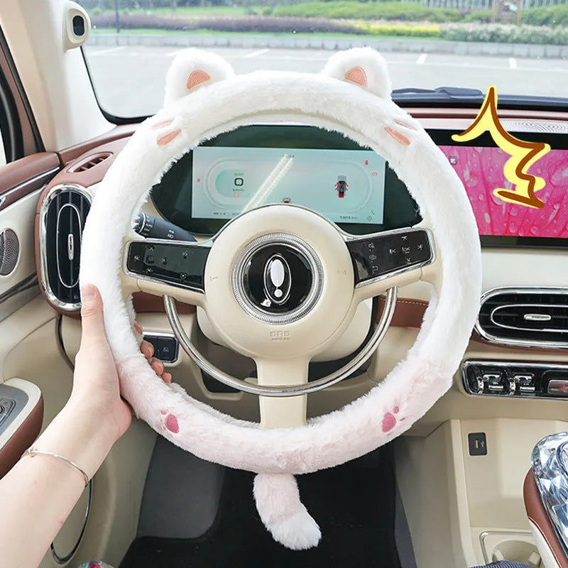 Plush rabbit fur steering wheel cover with embroidered panda design, shown fitted on a car wheel.