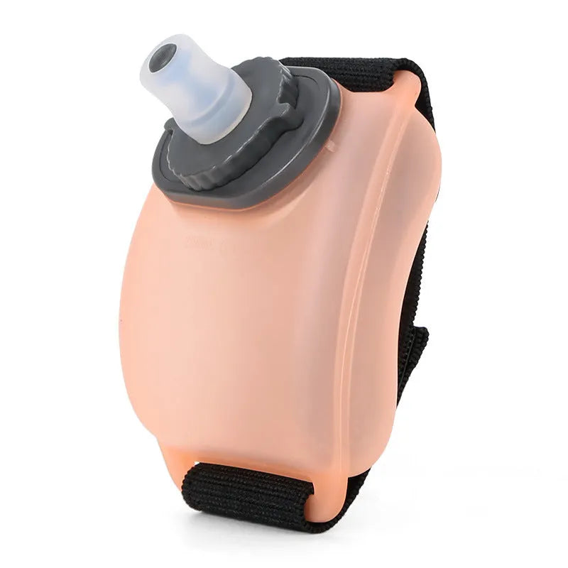 Orange wrist water bottle with Velcro strap for cycling and running sports