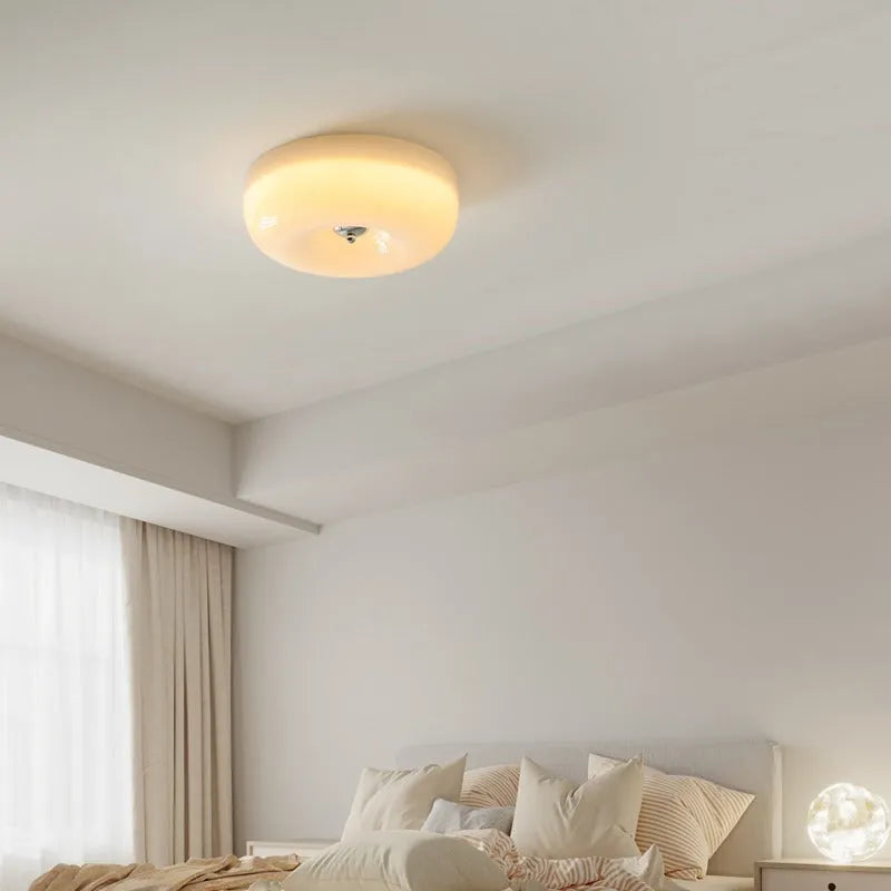 Cream-coloured American antique style ceiling lamp with a three-colour light function.