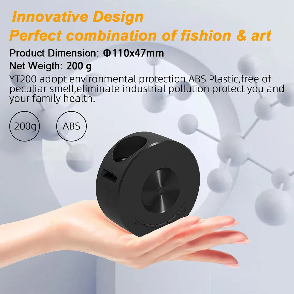 Black mini portable projector for children with phone connectivity on a table.