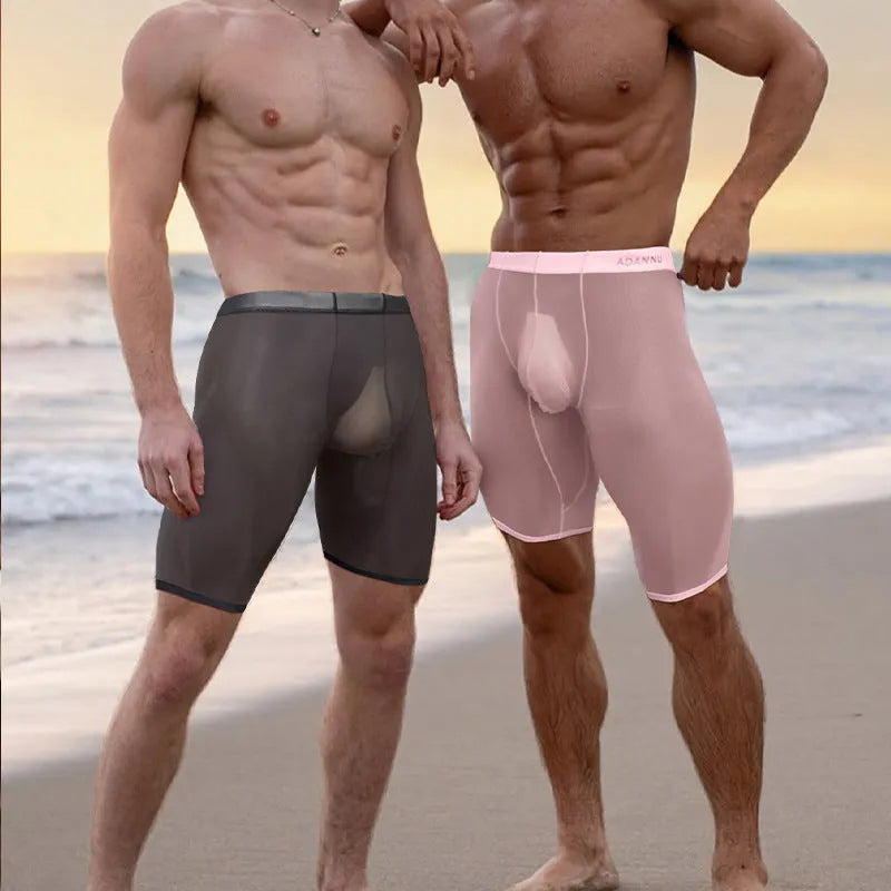 Men's seamless mesh shorts in black, shown flat
