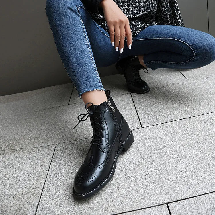 Women's chunky heel black classic boots with pointed toe, leather lining, and ethnic pattern