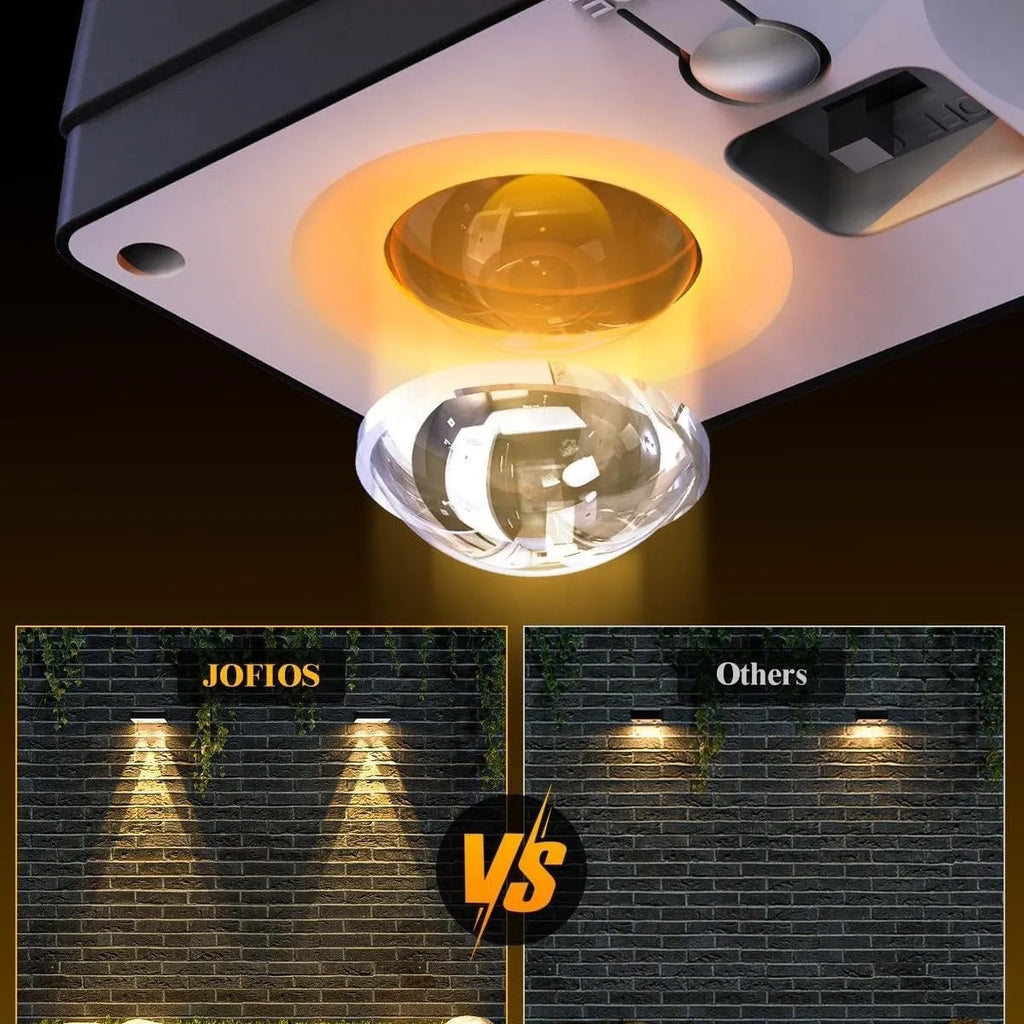 Black solar LED fence light with colourful fixed lens, IP55 rated, 105mm, mounted on a wooden fence