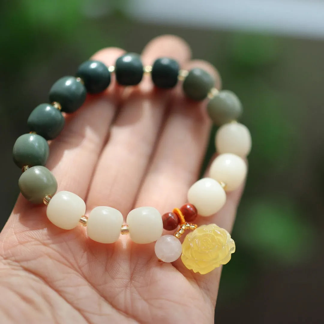 Natural bodhi root bracelet with 10mm beads in gradient white jade colour and lotus pendant