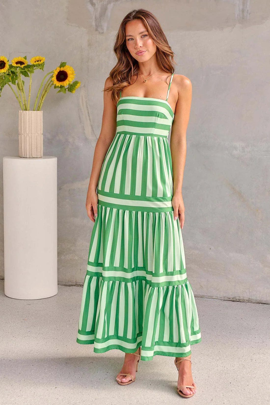 Stylish backless striped dress with square neckline, perfect for beach vacations