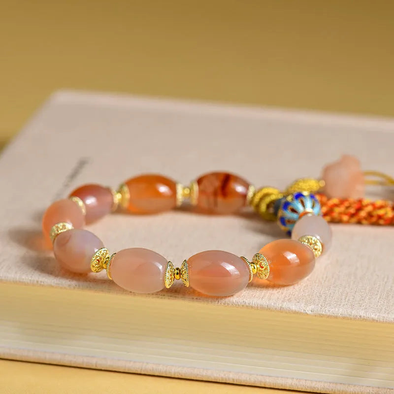 Jinsi jade agate Tibetan bracelet with carved lily flower motif and geometric shapes