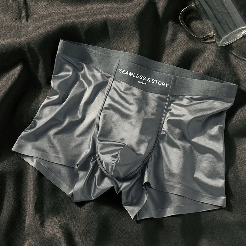 Men's mid-waist ice silk underwear in solid colours including coffee, light grey, white, and blue.