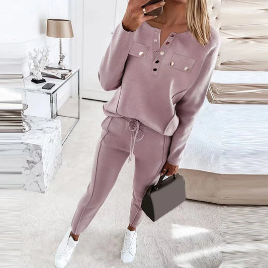 Cozy and stylish two-piece loungewear set with a cotton-blend sweatshirt top and matching drawstring pants