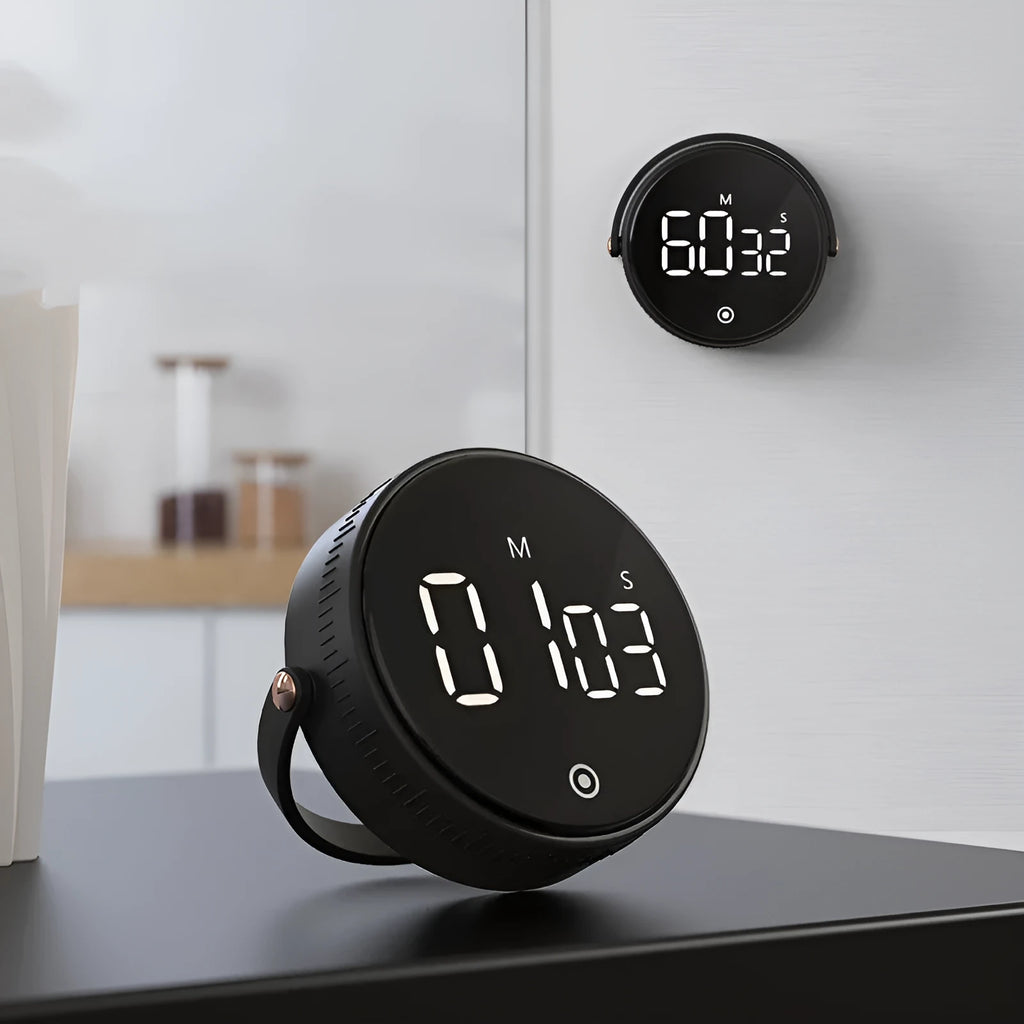Black rotary digital timer with LED display showing 00:00, compact size