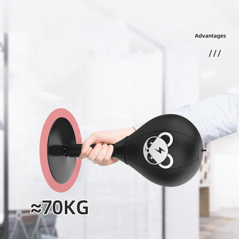 Tabletop inflatable boxing speed ball with suction cup base on a desk
