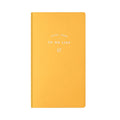 Simple Style 48K PU cover todolist notebook open on a desk, showing Macaron Yellow colour and lined writing paper.