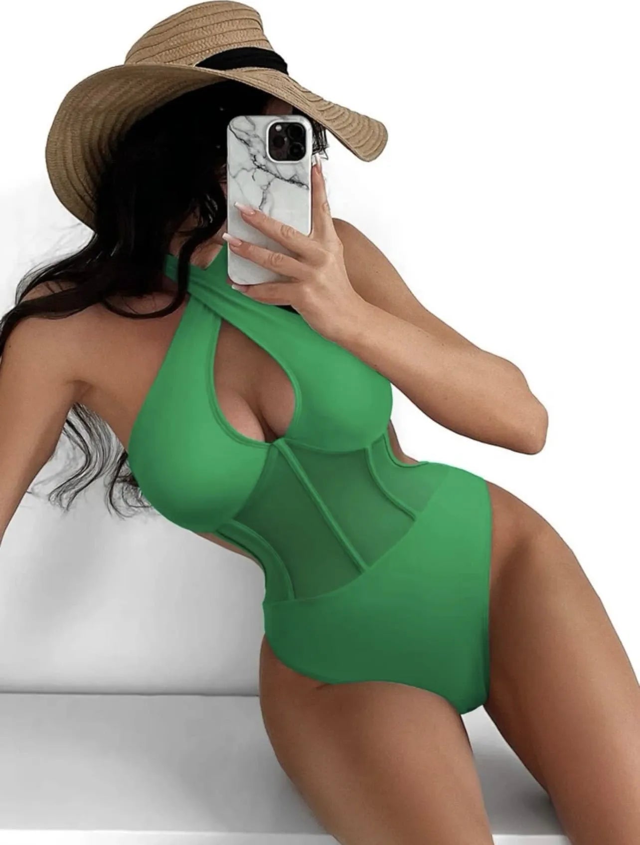 Women's black one-piece swimsuit bikini made from nylon and spandex fabric on mannequin