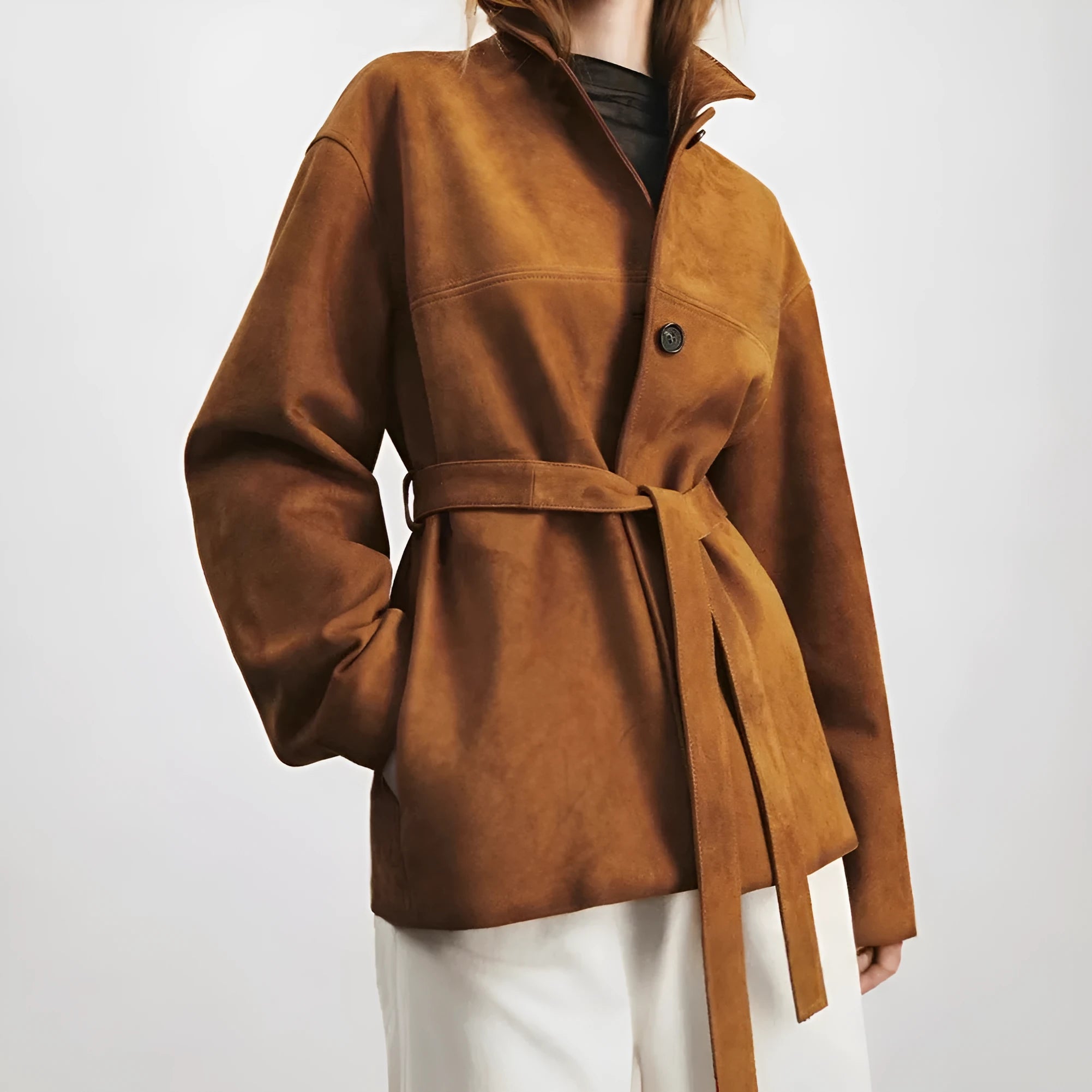 Women's caramel mocha cashmere blend retro coat with a Peter Pan collar and leather stitching.