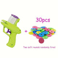 Interactive cat toy launcher with foam discs in green or purple colours