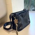 Small square crossbody bag in trendy cool colour made from Oxford cloth with shoulder strap