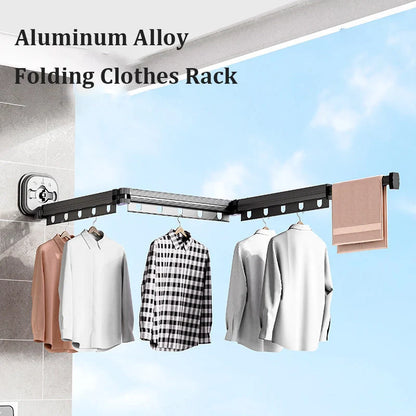 Aluminum retractable clothes drying rack mounted on wall with suction cups