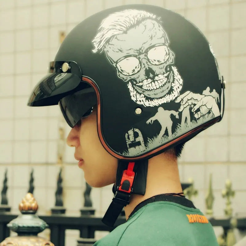 Retro style half helmet for motorcycle or electric scooter riding, shown in a vintage graphic colour option.