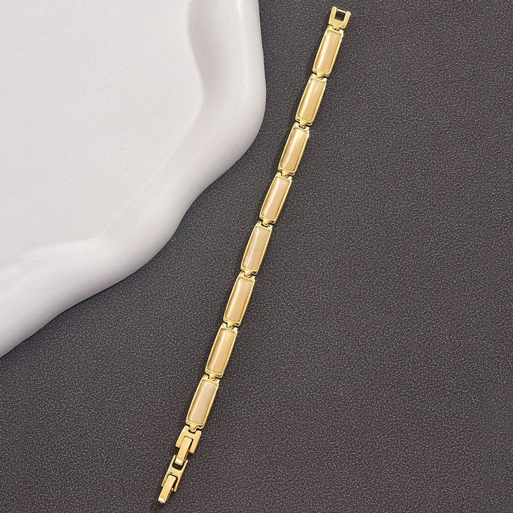 Geometric rose gold opal bracelet for women with quadrilateral alloy frame and gemstone inlay