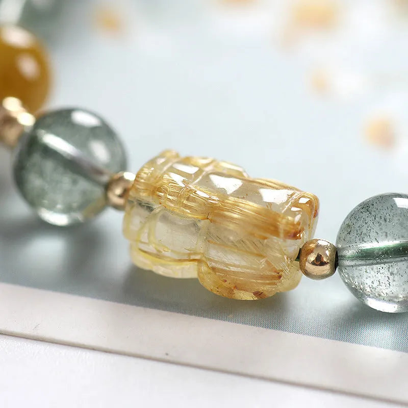 Green Phantom Quartz crystal bracelet with geometric beads and gold accents