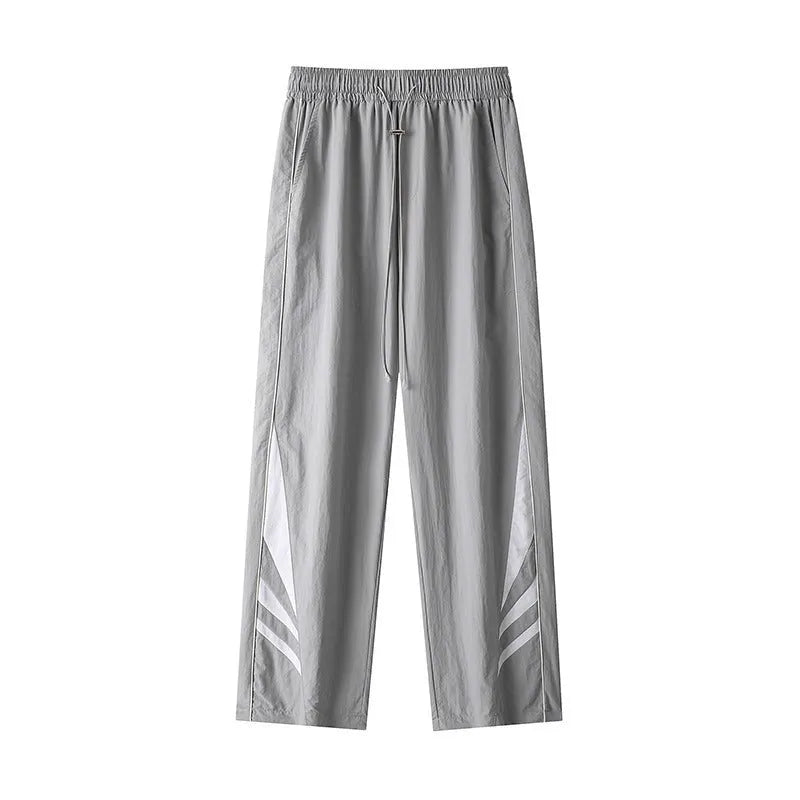 Men's black straight leg plus size casual sports trousers on a hanger.