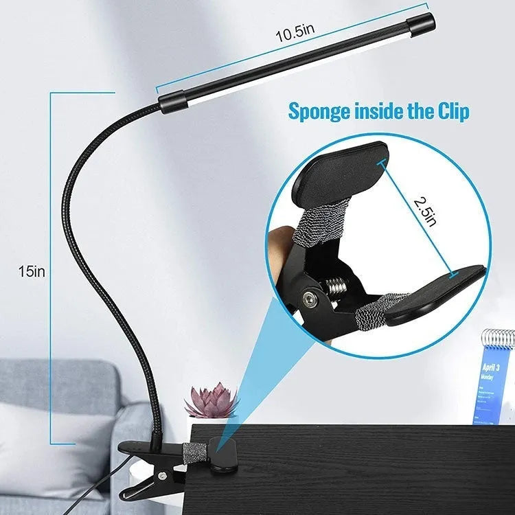 Black or white USB-powered LED desk lamp on a desk, showing its 26 cm compact length.