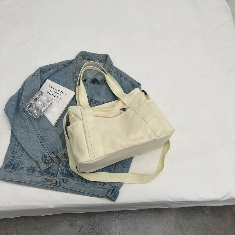 Women's solid colour polyester canvas shoulder bag with sandwich pockets and mobile phone compartment
