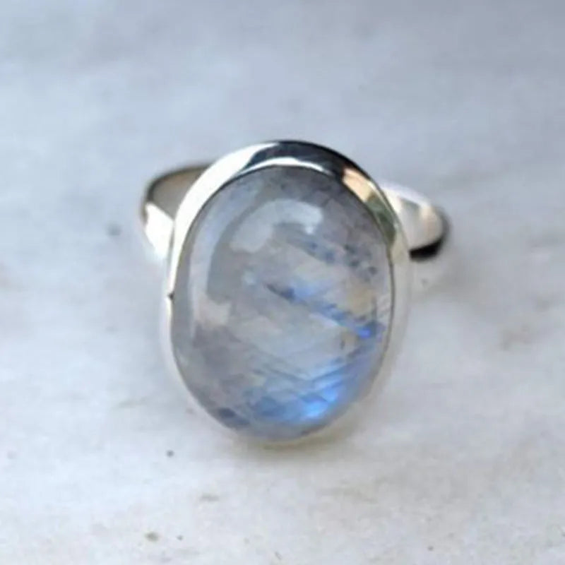 Vintage Thai silver moonstone ring with flower design in silver colour on alloy base
