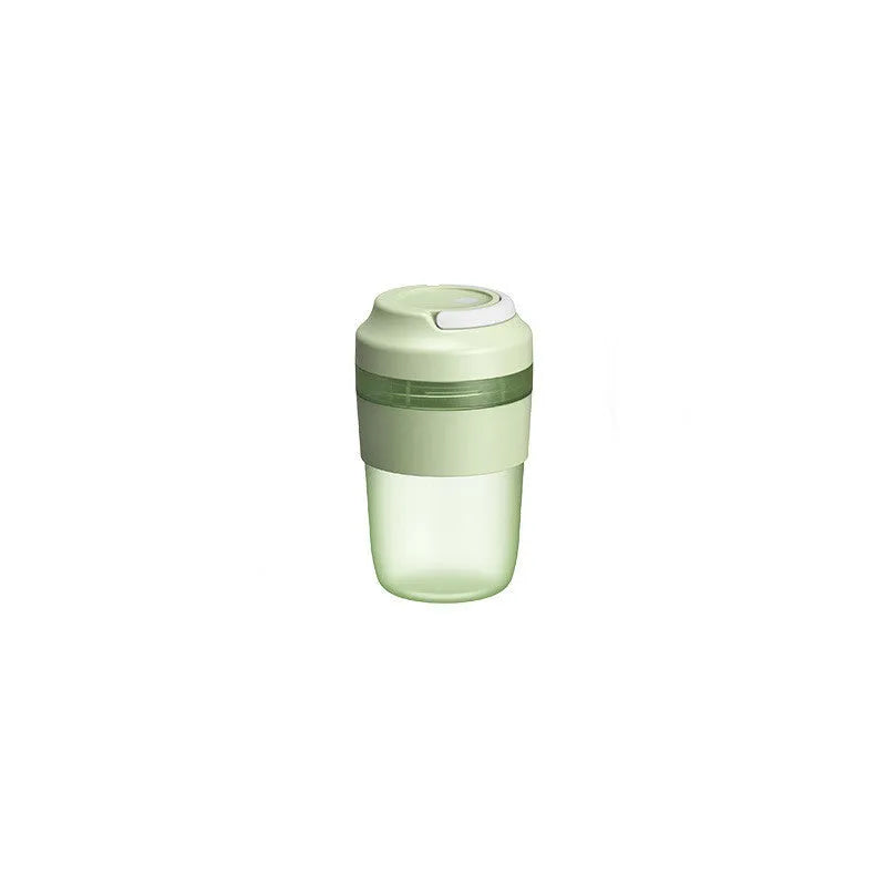 Grape purple portable blender cup with four stainless steel blades and USB charging cable.