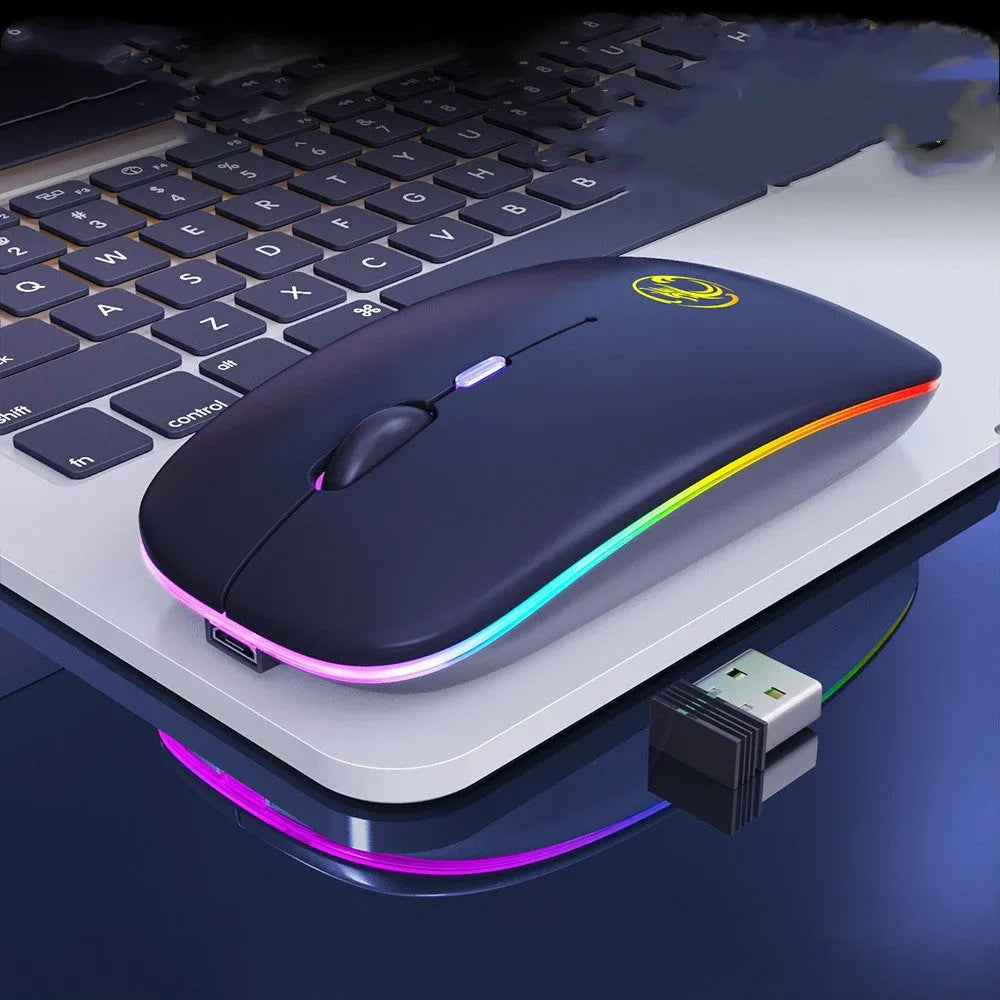 Black and white luminous charging Bluetooth dual-mode wireless silent mouse on a desk.