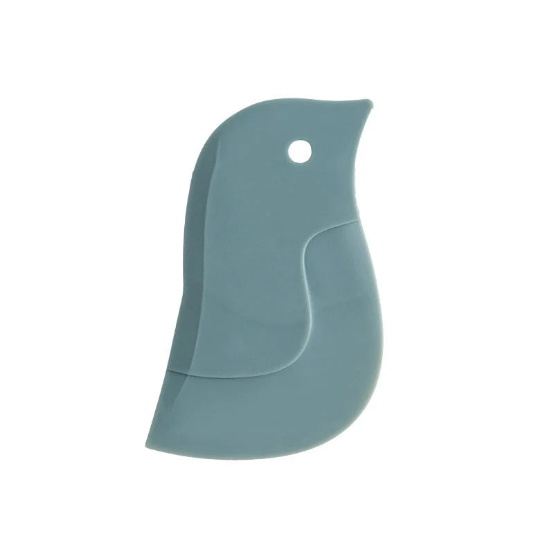 Penguin-shaped kitchen scraper for efficient plate and pot cleaning