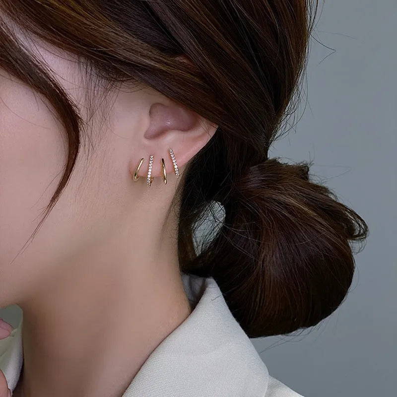 S925 silver needle four-prong zircon inlaid ear studs in gold finish, geometric shape, for women