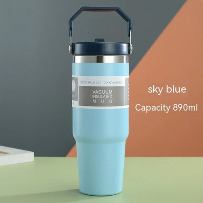 Insulated stainless steel travel tumbler with double-wall vacuum technology, sweat-proof powder coating, and BPA-free sliding lid for hot and cold drinks on the go.