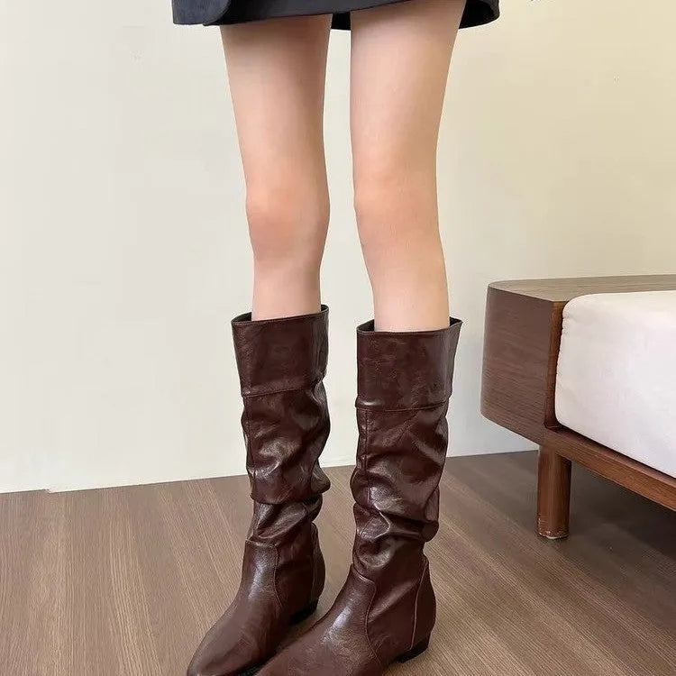 Women's retro square heel knee high boots in beige with pointed toe and hidden height increase