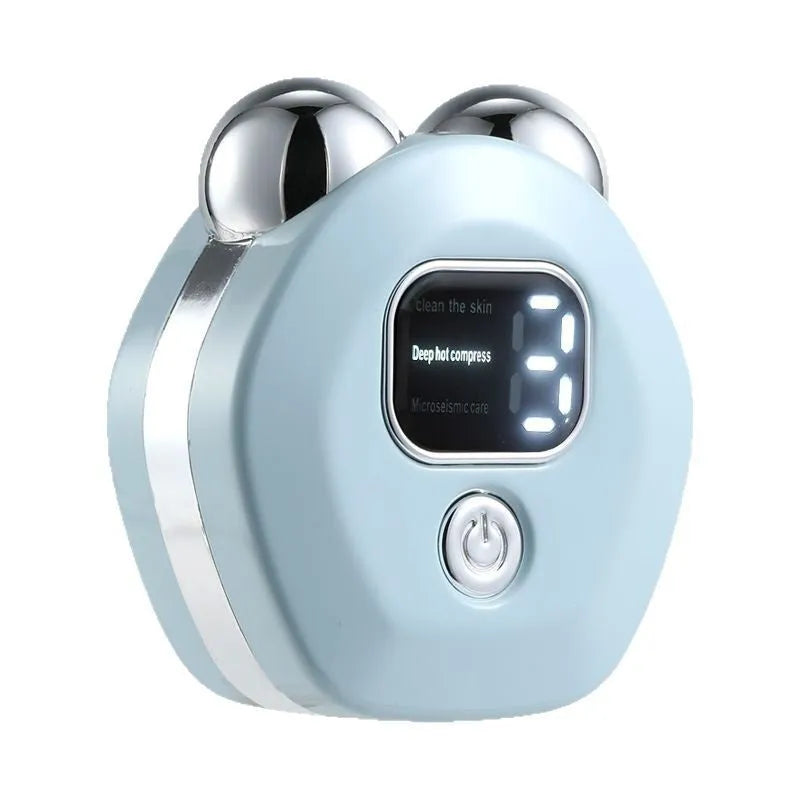 Portable white micro current double-roller facial massage instrument with hot compress function and USB charging cable.