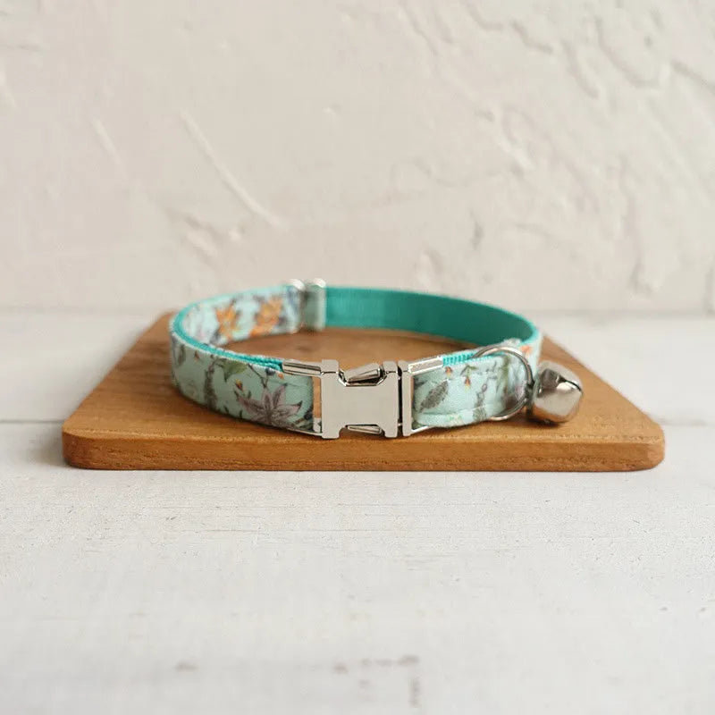 Green adjustable pet collar made from cloth and webbing suitable for dogs and cats with two sizes S and L