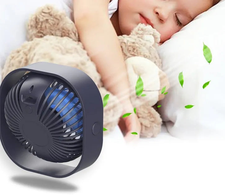 USB rechargeable desk fan with alarm clock display in blue, showing 360-degree rotation
