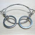 Stainless steel survival wire saw with pull rings, showing coiled 55 cm blade.