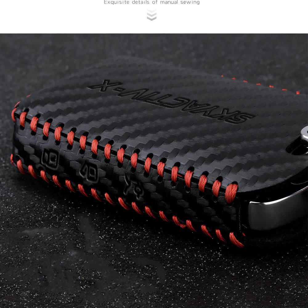 Black Angkesaila leather key case with 3D carbon fibre pattern and red stitching, 10 cm size for fob protection